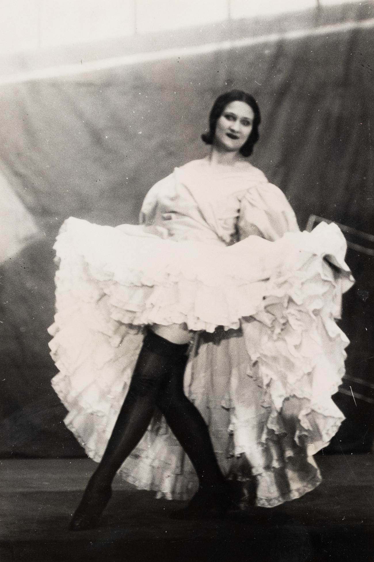 GERMAINE KRULL French Cancan Dancer 1920s Paris: GERMAINE KRULL. French Cancan, 1929. 8.5x5.7" gelatin silver print. Printed 1929. Artist's copyright stamp in blue ink on print verso. This series of pictures of the French Cancan Troupe was published