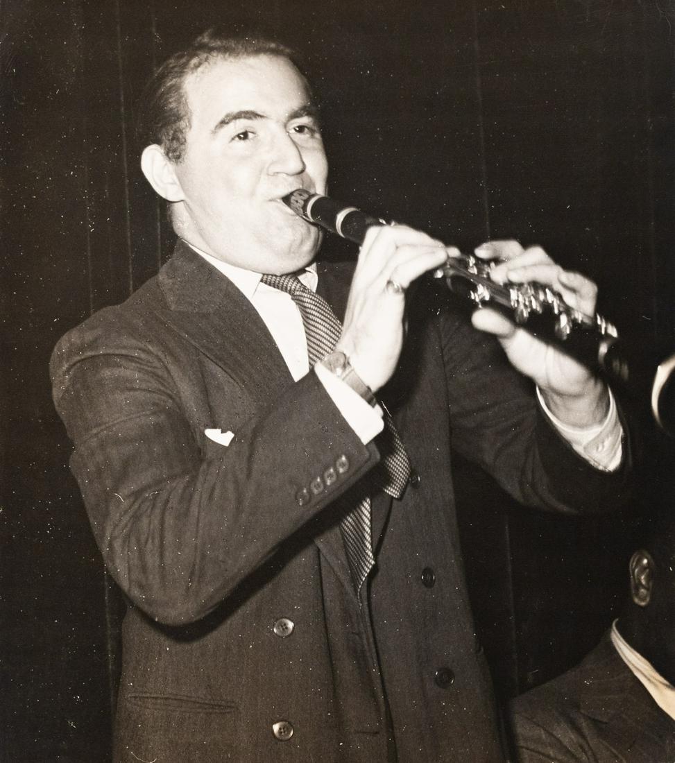 Benny Goodman in Concert 1940: UNIDENTIFIED. Benny Goodman, c. 1940. 12.5x11" gelatin silver print. Printed c. 1940s. Inscribed in pencil on print verso: Erenberg / Benny Goodman / PF127894 / [crossed out]. Benjamin "Benny" David G