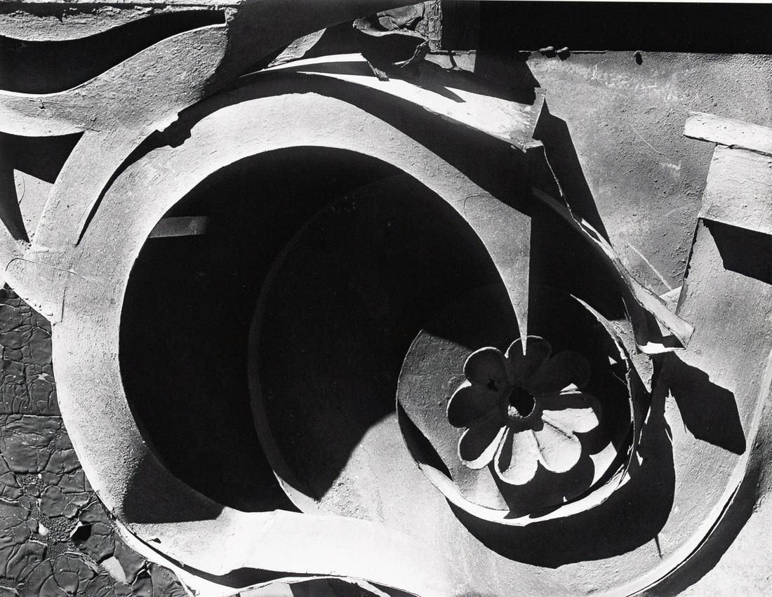 WALKER EVANS Tin Relic Abstraction 1930: WALKER EVANS. [Tin Relic with Rosette Motif, Photographed on Roof of 92 Fifth Avenue, New York City], 1930. 7.9x10.2" gelatin silver print, mounted on 14.8x19.8" board. Printed c. 1974. Signed and num