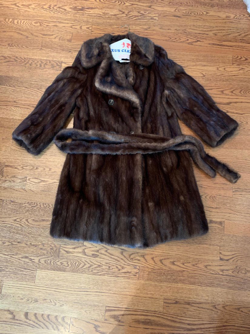 Fur Coat: This beautiful mink fur coat was once worn by Ruth Henderson. Her husband Skitch Henderson was the first band leader on the Johnny Carson show and the found of the New York Pops. The coat comes with a