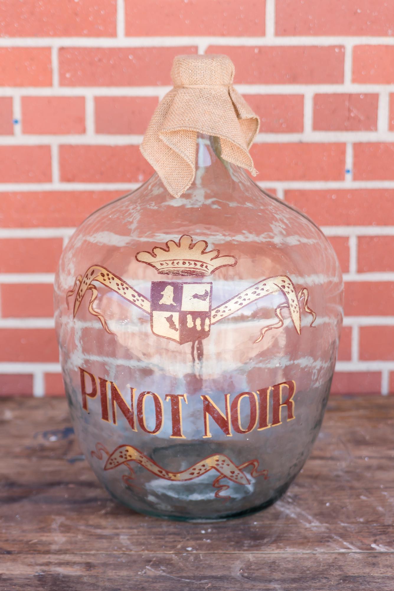 Vintage Wine Bottle: Vintage wine bottle with hand tied burlap top