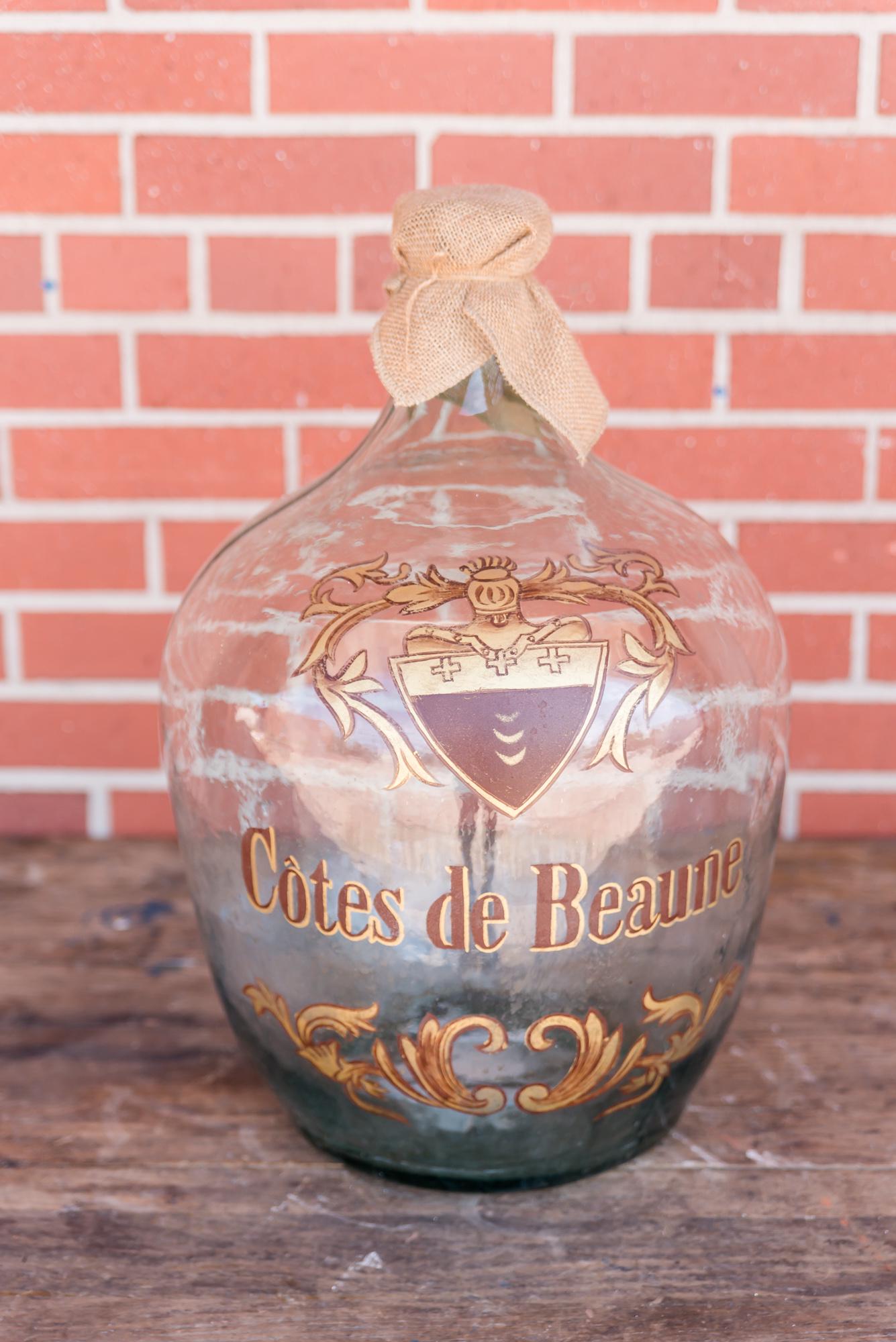 Vintage Wine Bottle: Vintage wine bottle with hand tied burlap top