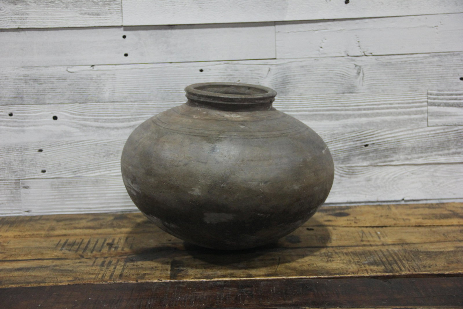 Primitive Clay Water Pot: This stunning clay pot was once used to store water in homes throughout India. Use it as an outdoor planter or a one of a kind shelf filler.