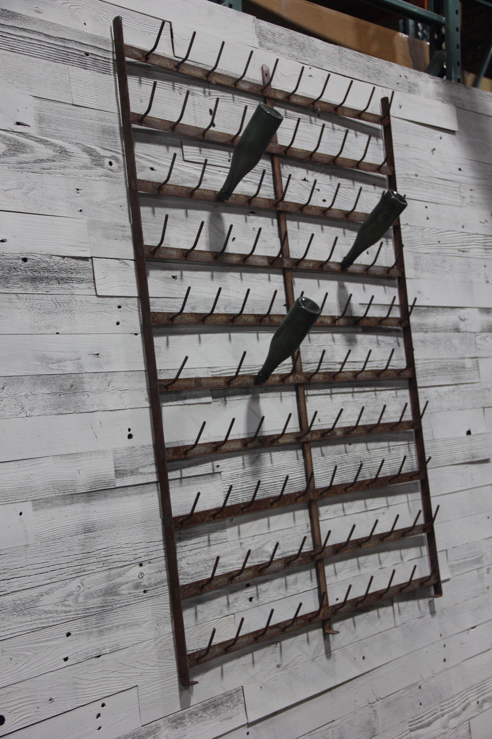 French Wall Mounted Bottle Drying Rack: Traditionally used to dry wine bottles in France, this metal wall mounted rack can be turned into a one of a kind art instilation, a coat rack, or for holding cups and mugs!