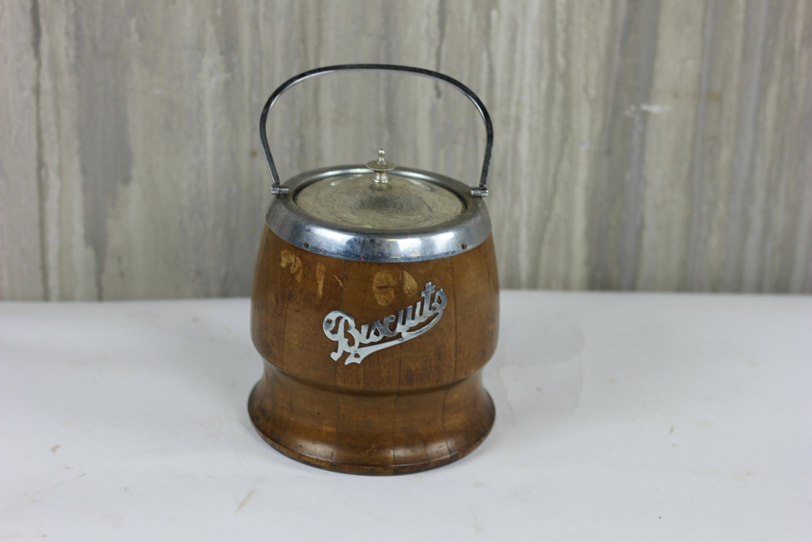 English Biscuit Barrel: English oak biscuit barrel with porcelain liner.