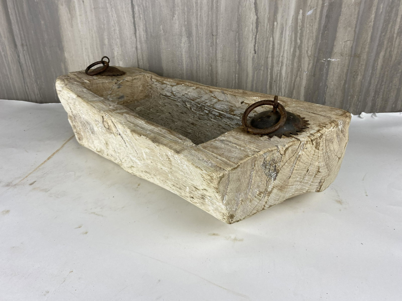 Bleached Wooden Tray: Beautiful hand carved bleached wood "trough" adorned with metal handles. Great decorative accent piece on a coffee table, mantle, or console.