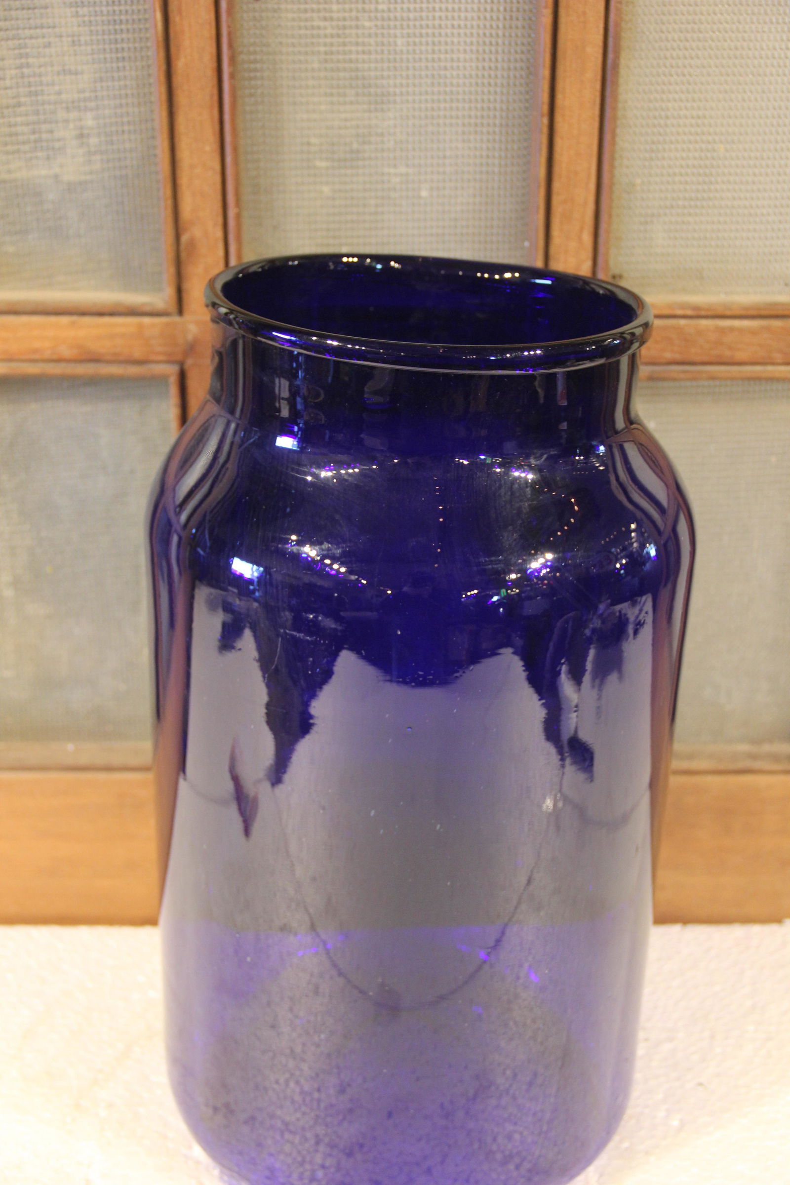 Large Cobalt Pickle Jar: This style jar was used throughout Eastern Europe to make large batches of pickles and sauerkraut. Now it can be repurposed into a beautiful flower vase