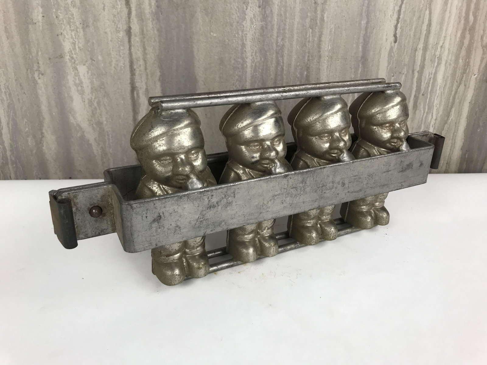Vintage Belgium Chocolate Mold: Authentic 2-part chocolate mold of a boy picking his nose. Originally from a Belgium choclate factory