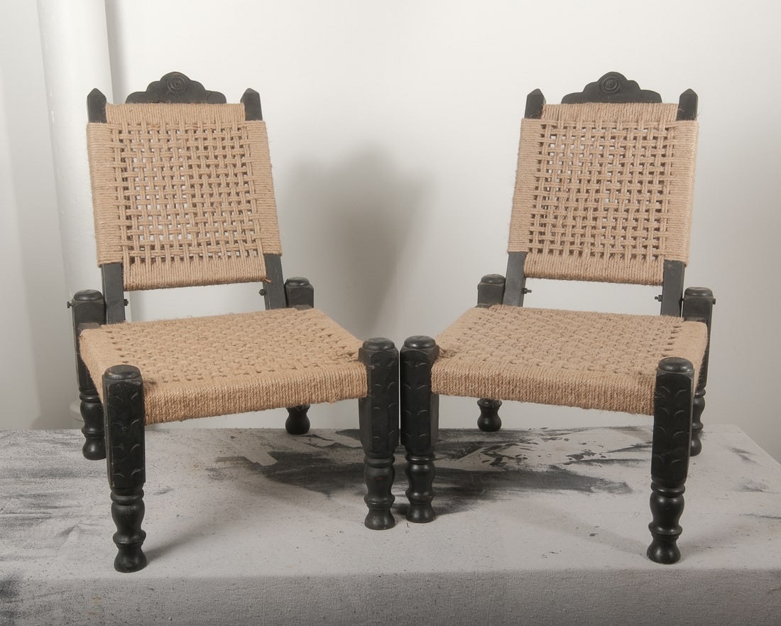 Pair of Petite Rope Seat Chairs: A unique pair of hand woven rope seat chairs in a black stain finish that recline