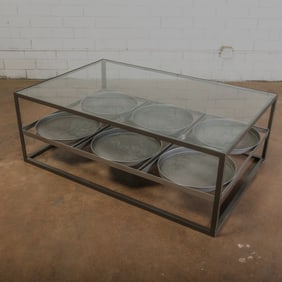 Glass topped coffee table with whimsicle Bakers cake rack base