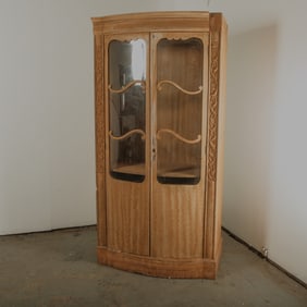 Louis XV style Bow front Glass Cabinet with carved wood details