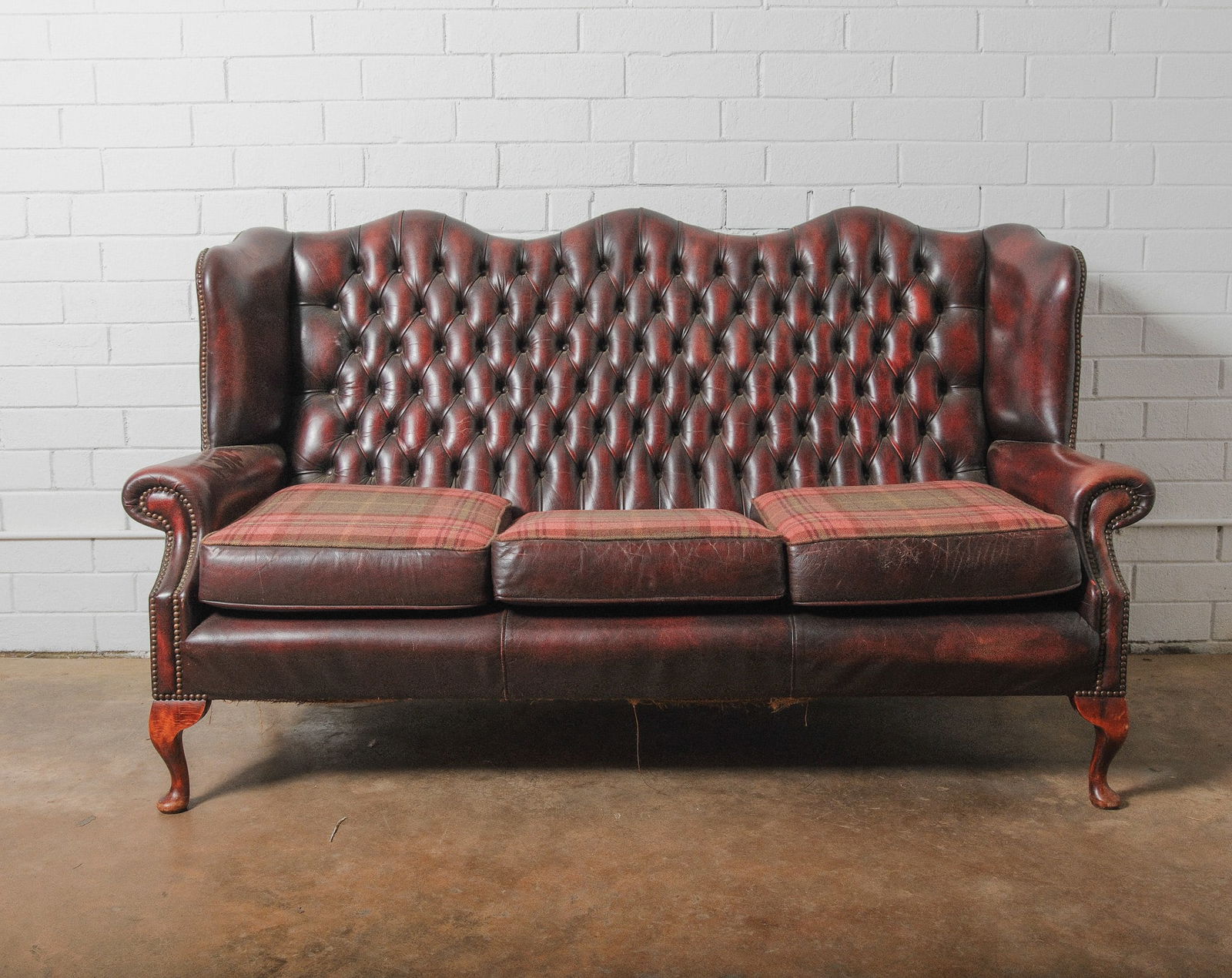 Vintage Tufted Leather Chesterfield Sofa with Tartan Cushions (1 of 5)