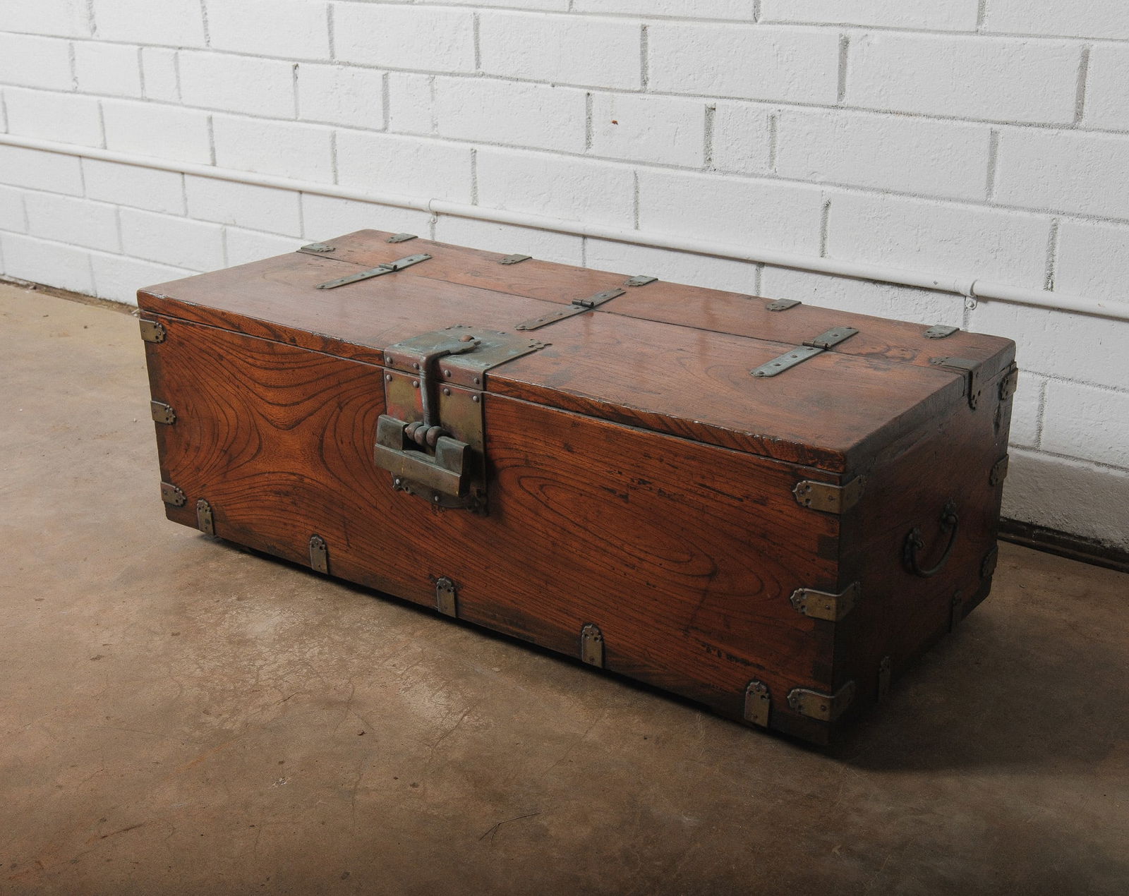 Early 20th century wooden travel trunk with iron hardware (1 of 8)