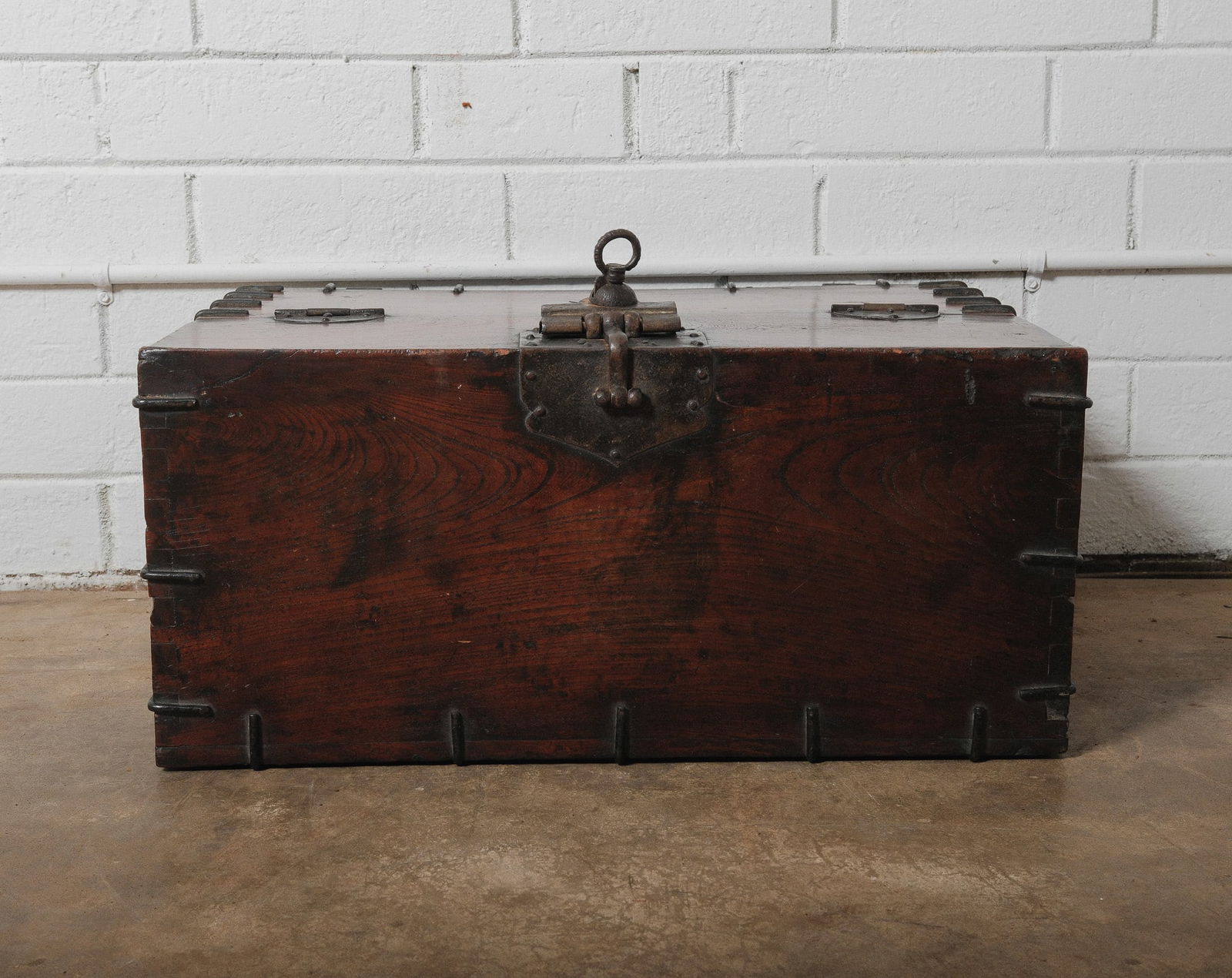 Early 20th century wooden travel trunk with iron hardware (1 of 8)