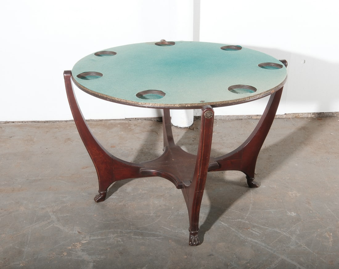 Mid-Century Modern Flip Top Felt Game Table: A striking mid ventury game table featuring a hinged circular table that flips open to reveal a vibrant green felt table top.