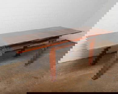 Expanding Oak Dining Table: A substantial rectangular dining table featuring a thick plank top supported by square block legs with a center stretcher for added subility. It measures 30" x 50" without expansion, 30' x90" when ful