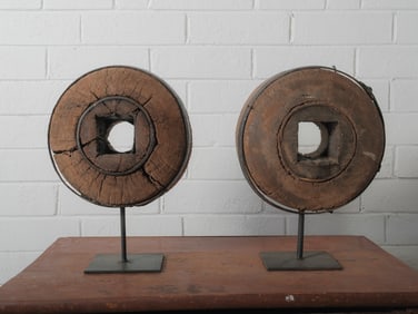 Pair of Antique Wooden Wagon Wheel Hubs on Stands