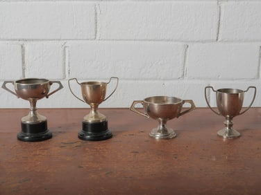 Group of Four English Metal Trophy Cups