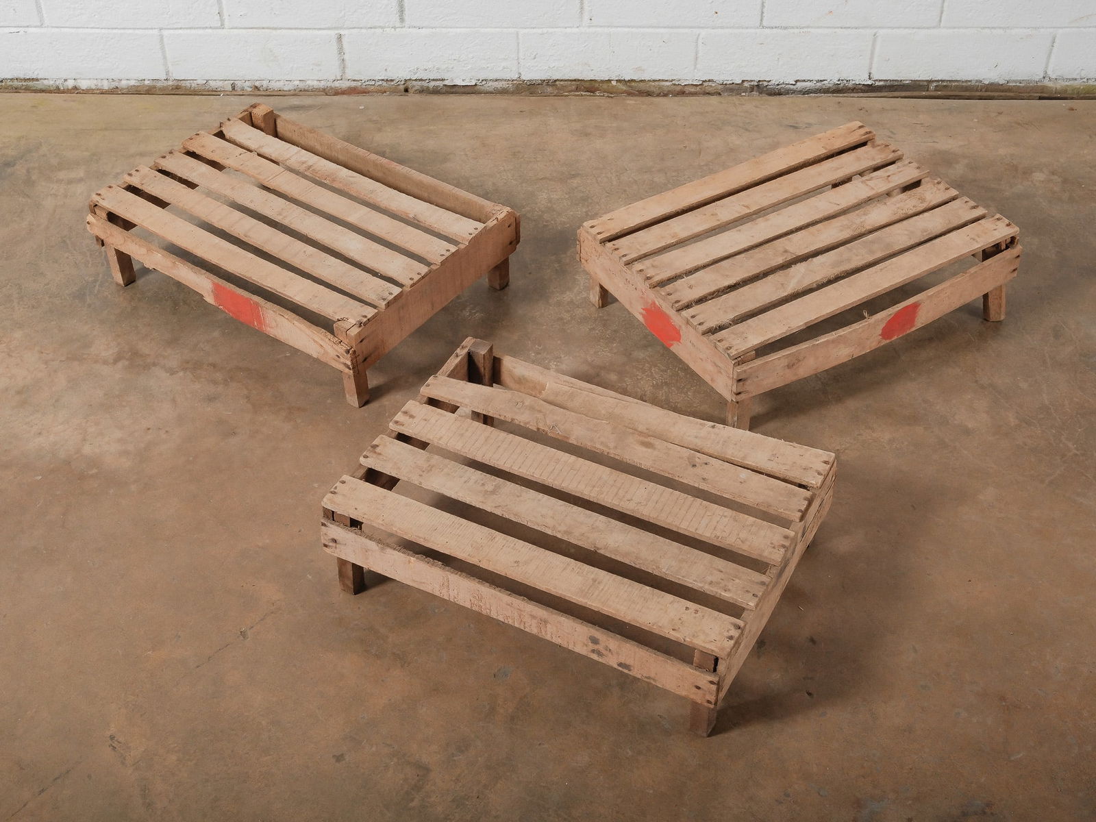 Set of 3 Vintage Fruit Crates: A set of three low rustic crates constructed from solid wood pallet material. Great for storage or decorative use in any interior.