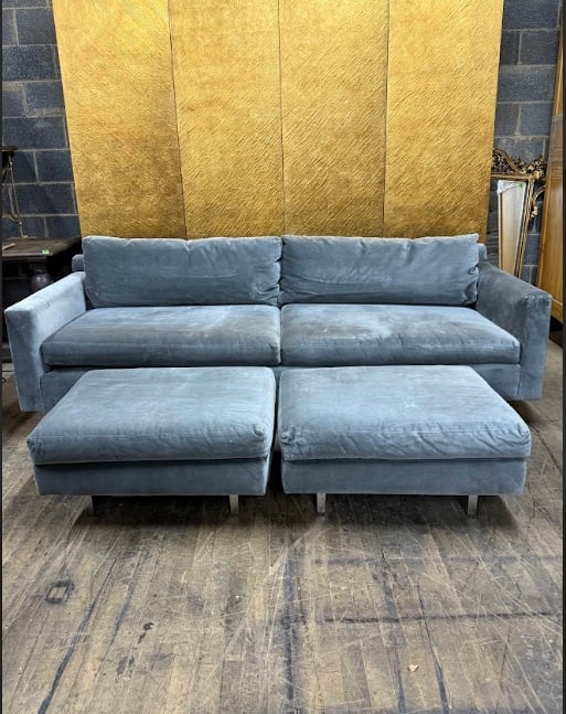 Mitchell Gold Bob Williams Sofa with Pair of Ottoman Footrests: Contemporary upholstered sofa featuring soft gray velvet fabric and a clean, modern silhouette. The sofa includes plush seat and back cushions with wide track arms for a comfortable and relaxed