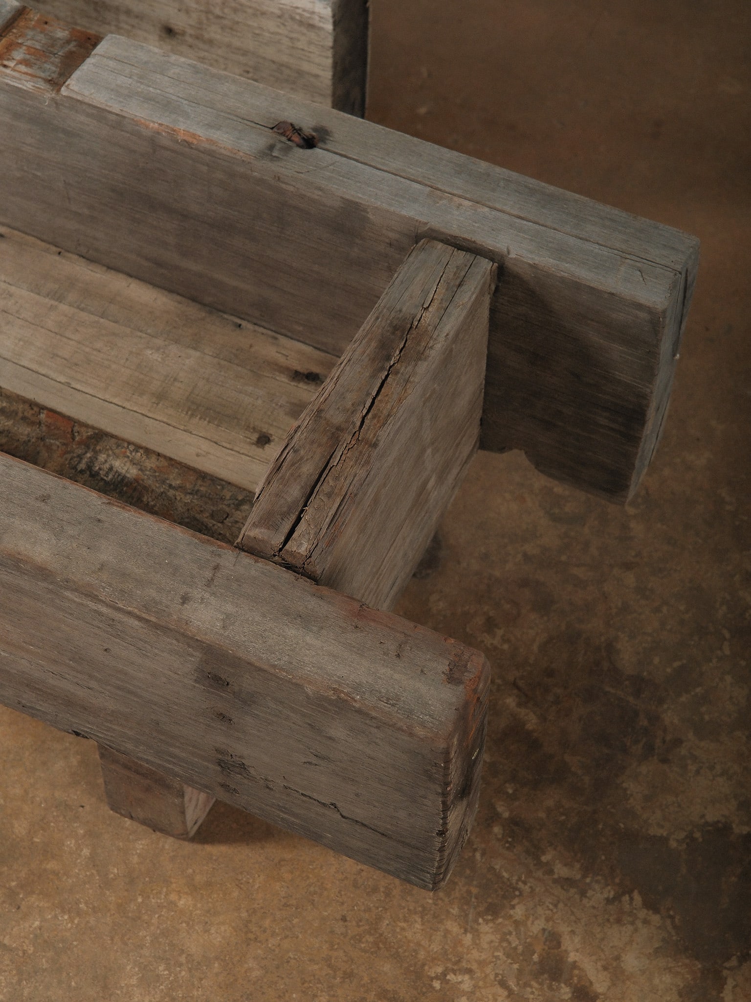Pair of Rustic Wooden Planters: Pair of rustic wooden planters constructed from reclaimed timber with visible nail holes, weathering, and remnants of old paint. The rectangular trough form and aged wood give them strong farmhouse an