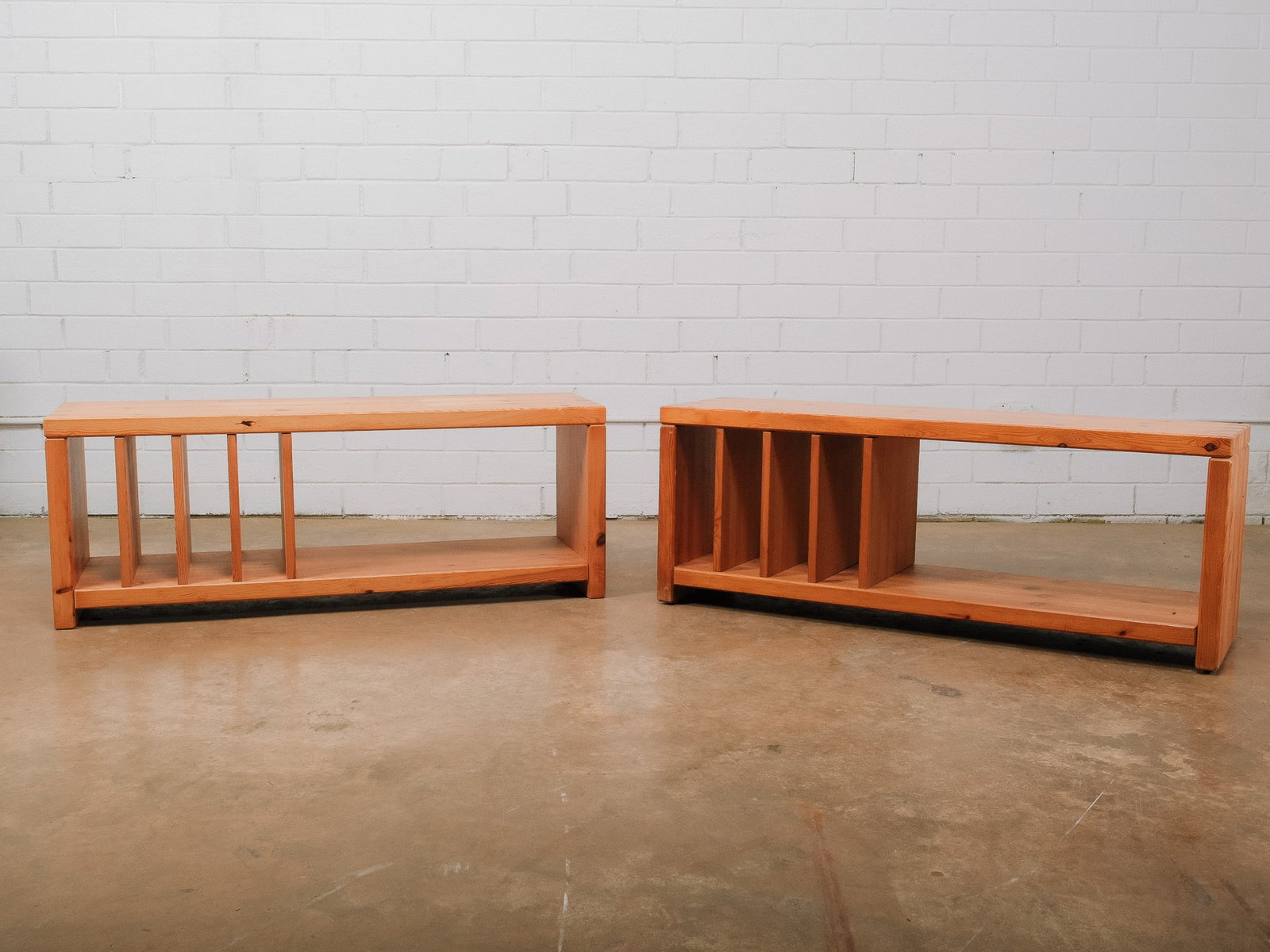 Pair of Modular MCM Shelving Units: Pair of modular mid-century modern wood shelving units designed for versatile storage and display. One unit features vertical dividers ideal for organizing books, records, or magazines, while the