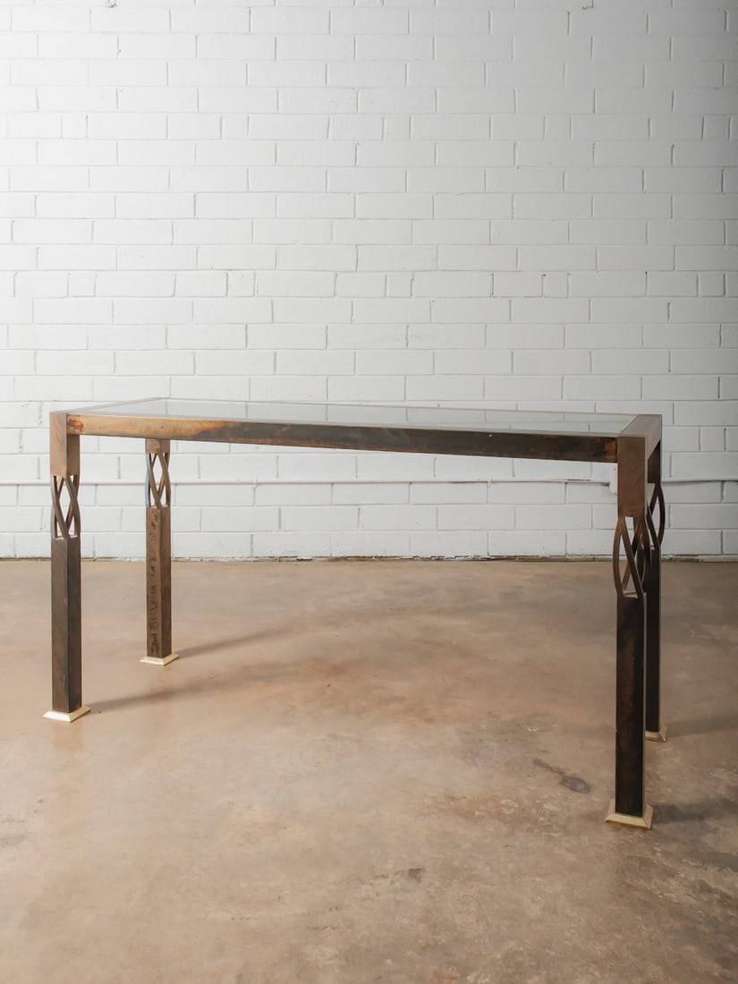 Modern Metal & Glass Console Table: Rectangular console table with metal frame construction, glass top and square legs. Clean-lined form suitable for entry or gallery use.Approximate Dimensions: 28.5"h x 53"w x 18"d