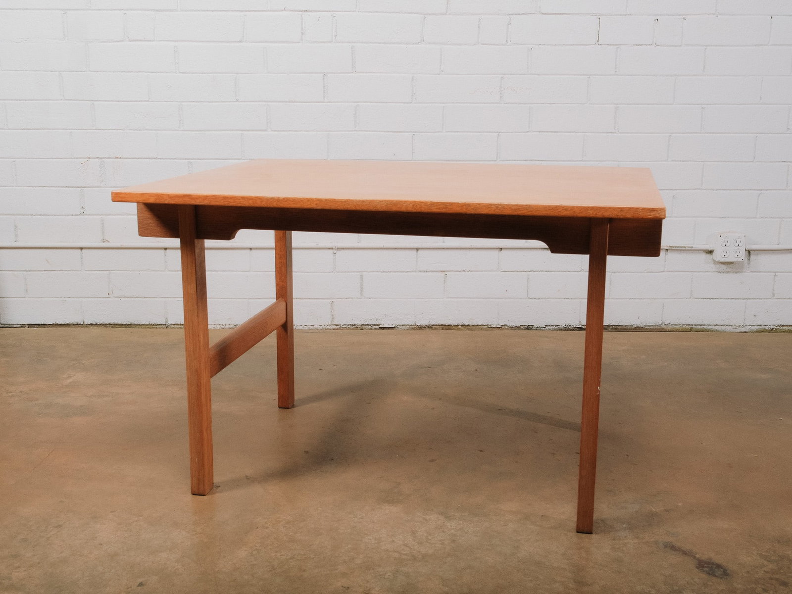 Lift Top Work Table: Versatile wood work table featuring a lift-top surface that raises to create an adjustable-height workspace for drafting, writing, crafting, or laptop use. Clean, minimalist design with straight legs