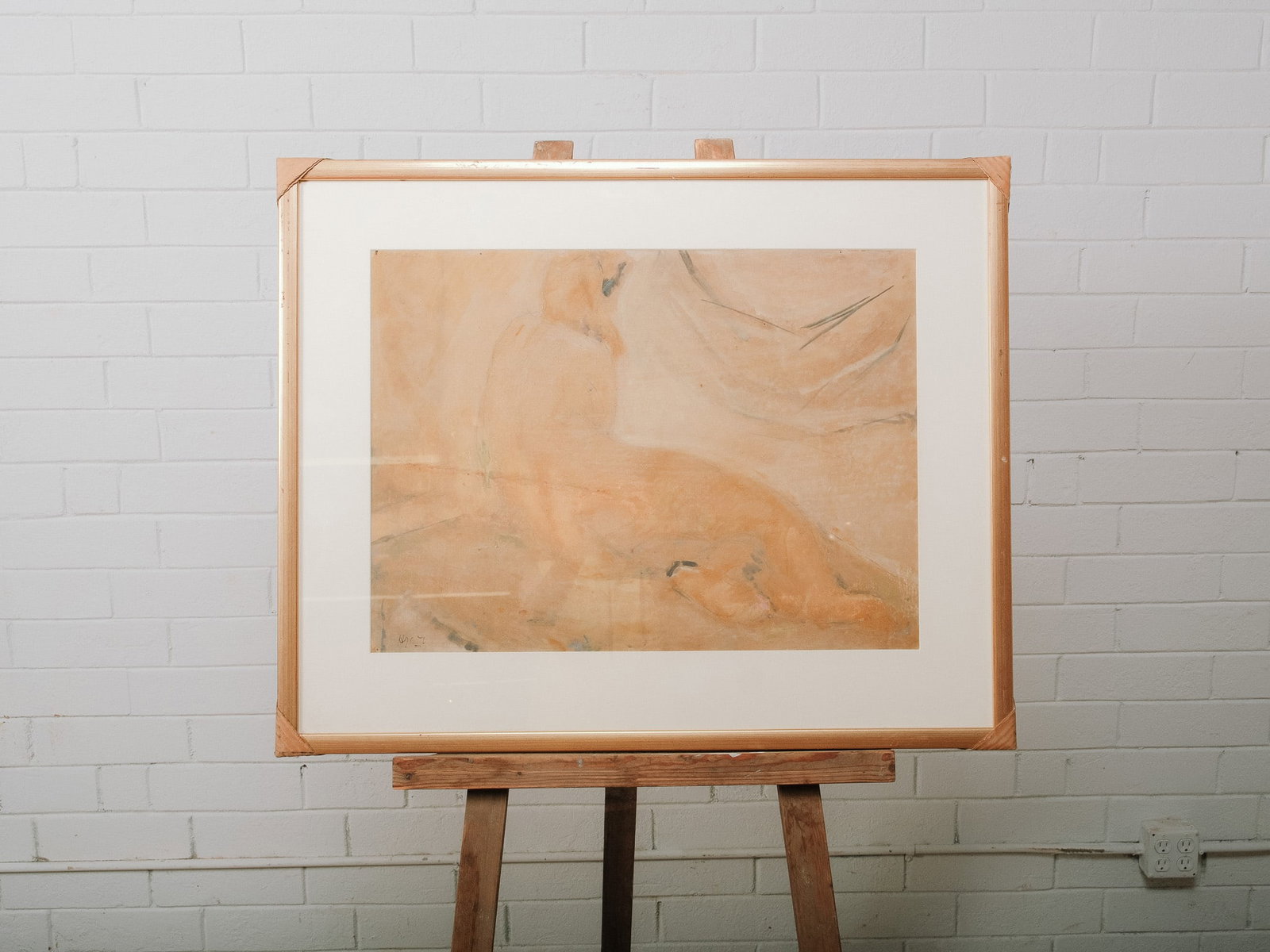 Abstract Figural Mixed Media: Abstract figural composition rendered in soft earth tones with loose gestural forms and minimal line work. Signed lower left and presented under glass in a light wood frame with white mat.Approximate