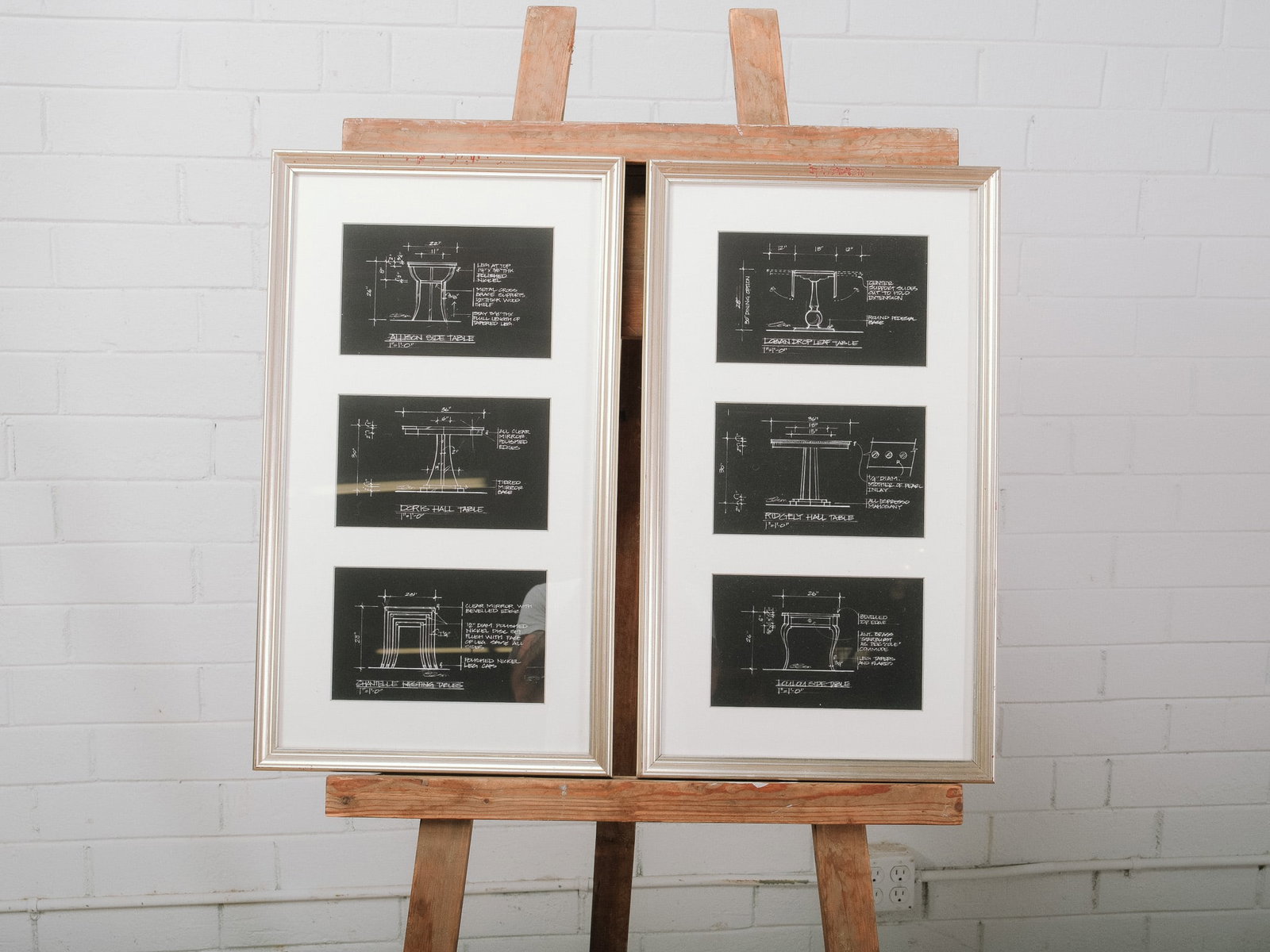 Pair of Framed Furniture Design Prints: Pair of framed decorative prints featuring furniture design drawings rendered in blueprint style. Each frame displays three detailed elevations and measurements, making this set an excellent choice