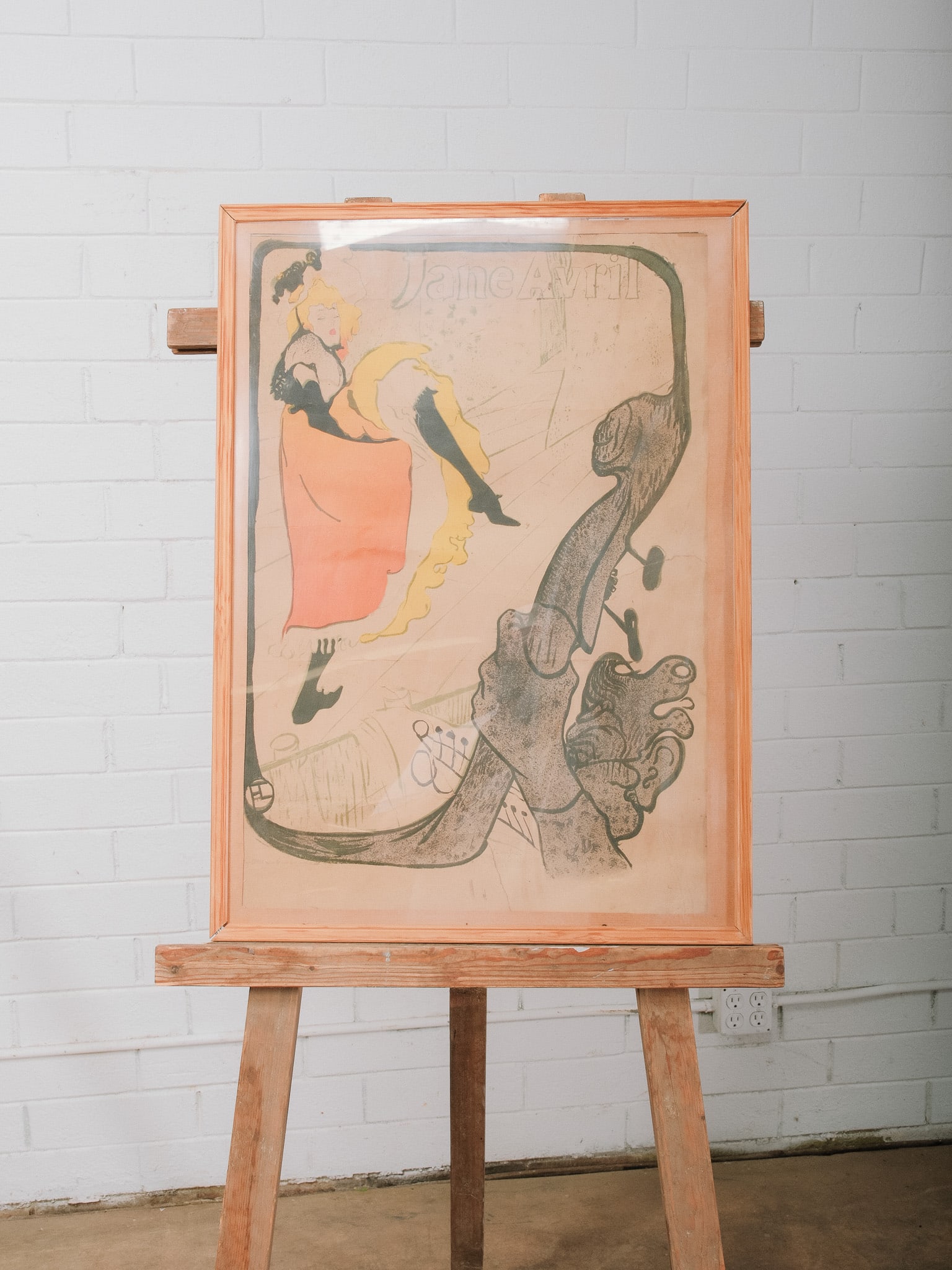 Framed Jane Avril Poster: Framed reproduction of the iconic Jane Avril poster by Henri de Toulouse-Lautrec, depicting the famed Parisian dancer in the artist's signature Art Nouveau style. A timeless decorative piece celebrati