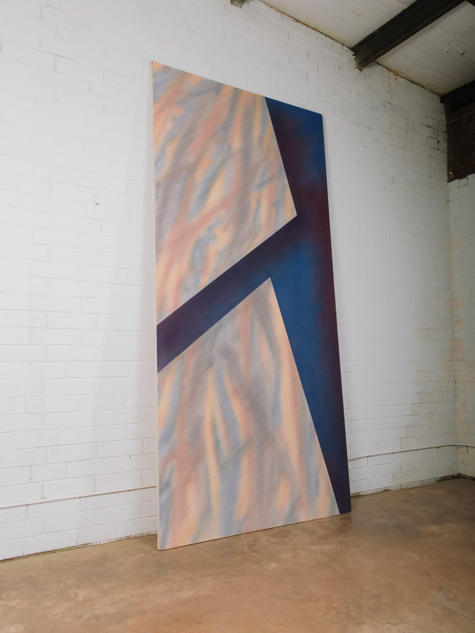 Large Contemporary Abstract Canvas Artwork: Large contemporary abstract artwork on canvas featuring a bold geometric composition in deep navy and indigo contrasted against softly blended fields of pale blue, blush, cream, and lavender. The