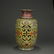 YELLOW GROUND FAMILLE ROSE 'FLORAL' VASE WITH ROTATING