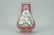 ROUGE-RED GROUND FAMILLE ROSE 'FLOWERS AND BIRDS' VASE