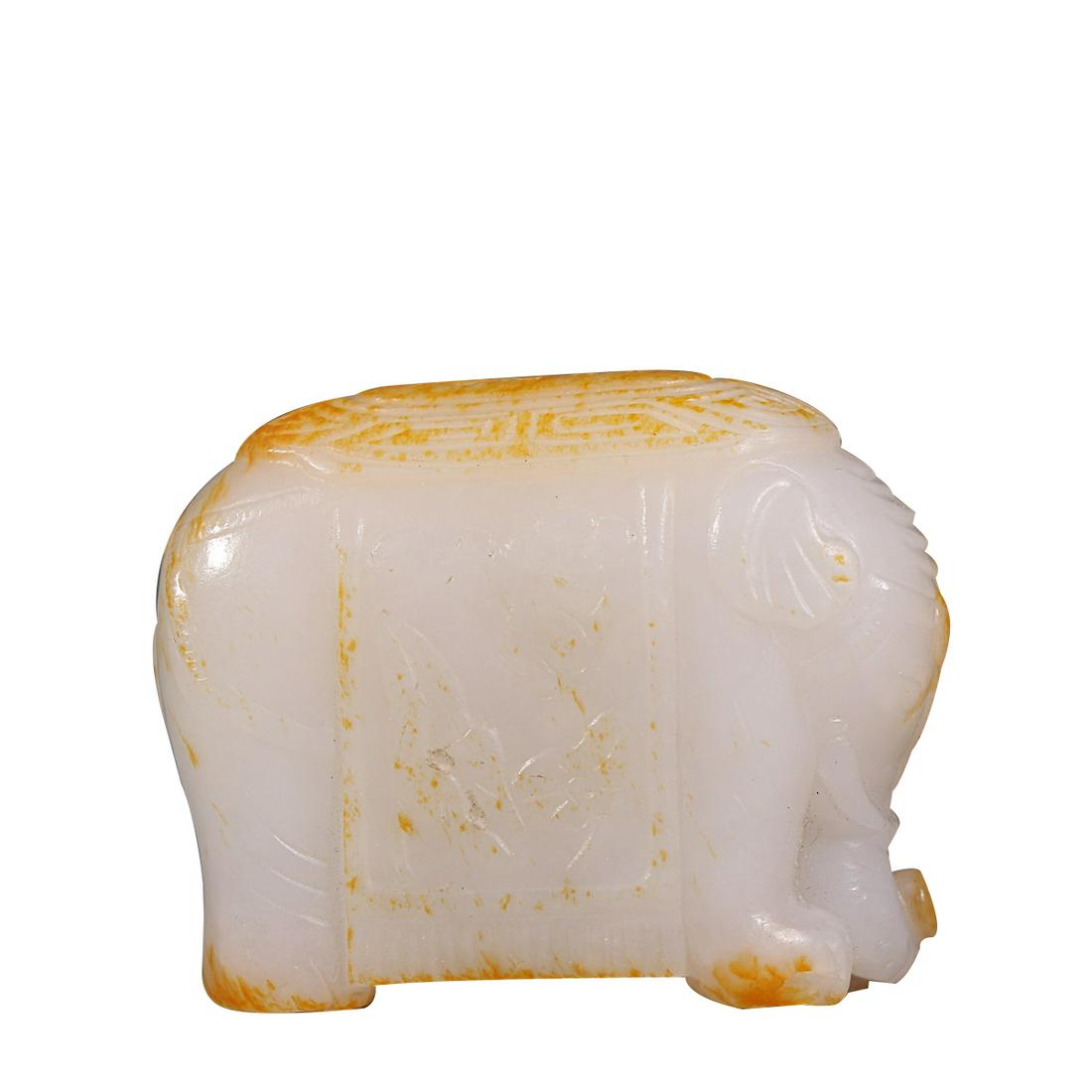 HETIAN JADE 'ELEPHANT' CARVING: Height 3.75cm/ Length 4.75cm/ Weight 74.3g/ Description Statement: Any description statement is given as a courtesy to a client, is an opinion and should not be treated as a statement of fact and Merc