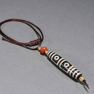 DZI BEAD: Bead-Diameter: Length: 6.7cm, Width: 1.5cm. Weight: 32g Description Statement: Any description statement is given as a courtesy to a client, is an opinion and should not be treated as a statement of