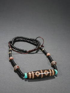 DZI NECKLACE: Bead-Diameter 5.05*1.4cm Description Statement: Any description statement is given as a courtesy to a client, is an opinion and should not be treated as a statement of fact and Merces Gallery shall