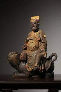 GILT-LACQUERED PHOEBE ZHENNAN  FIGURE OF CAISHEN
