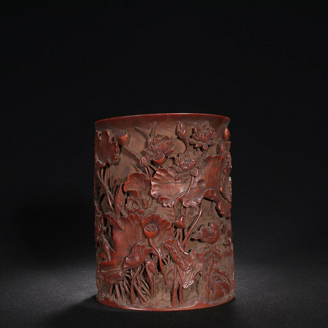 CHINESE BAMBOO BRUSHPOT WITH CARVED 'LOTUS POND': Height: 17.7cm, Length: 14cm, Width: 12.7cm. Weight: 382g Description Statement: Any description statement is given as a courtesy to a client, is an opinion and should not be treated as a statement of