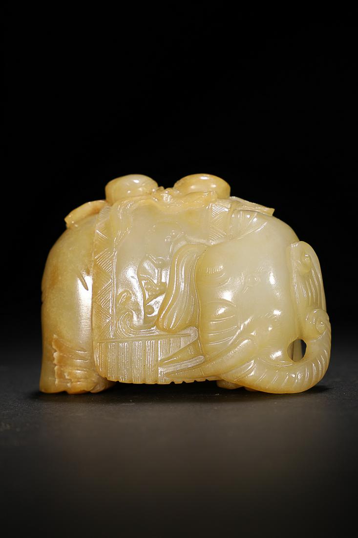 CHINESE HETIAN JADE ORNAMENT, 'TAI PING YOU XIANG': 4x7x5cm. Weight: 0.24kg Description Statement: Any description statement is given as a courtesy to a client, is an opinion and should not be treated as a statement of fact and Merces Gallery shall hav