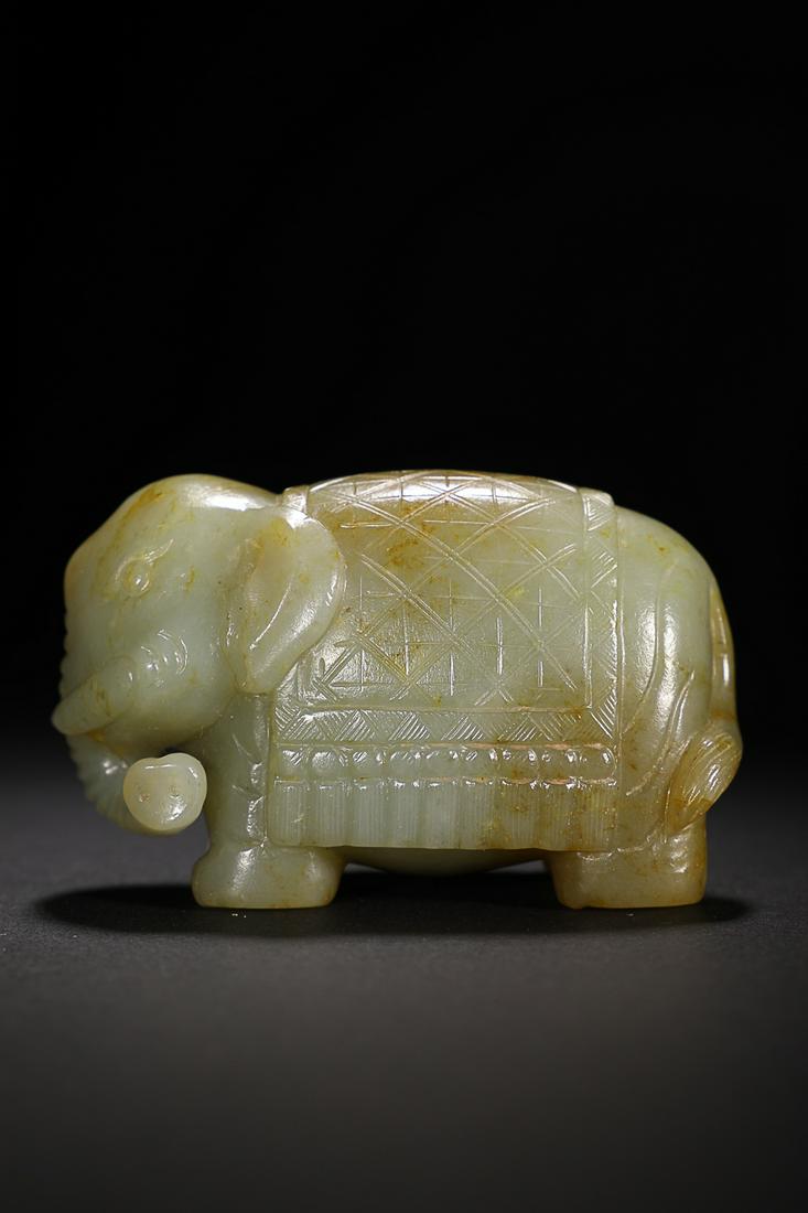 CHINESE HETIAN JADE ORNAMENT, 'TAI PING YOU XIANG': 7.5x3.8x4.9cm. Weight: 0.22kg Description Statement: Any description statement is given as a courtesy to a client, is an opinion and should not be treated as a statement of fact and Merces Gallery sha