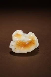 CHINESE HETIAN JADE HANDPIECE, 'AUSPICIOUS BEAST': 5x4.5x3cm. Weight: 0.1kg Description Statement: Any description statement is given as a courtesy to a client, is an opinion and should not be treated as a statement of fact and Merces Gallery shall ha