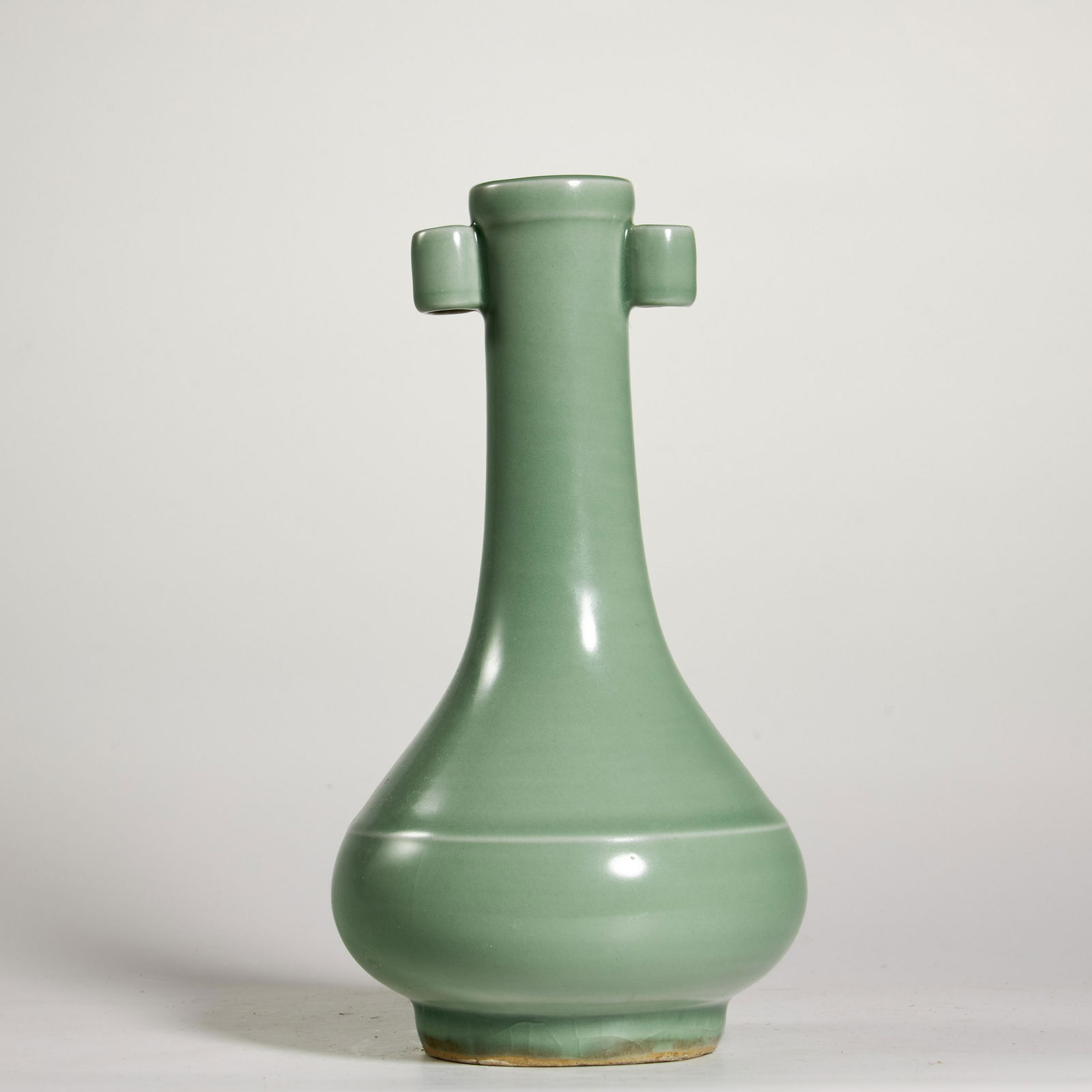 A CELADON GLAZED PORCELAIN VASE (1 of 4)