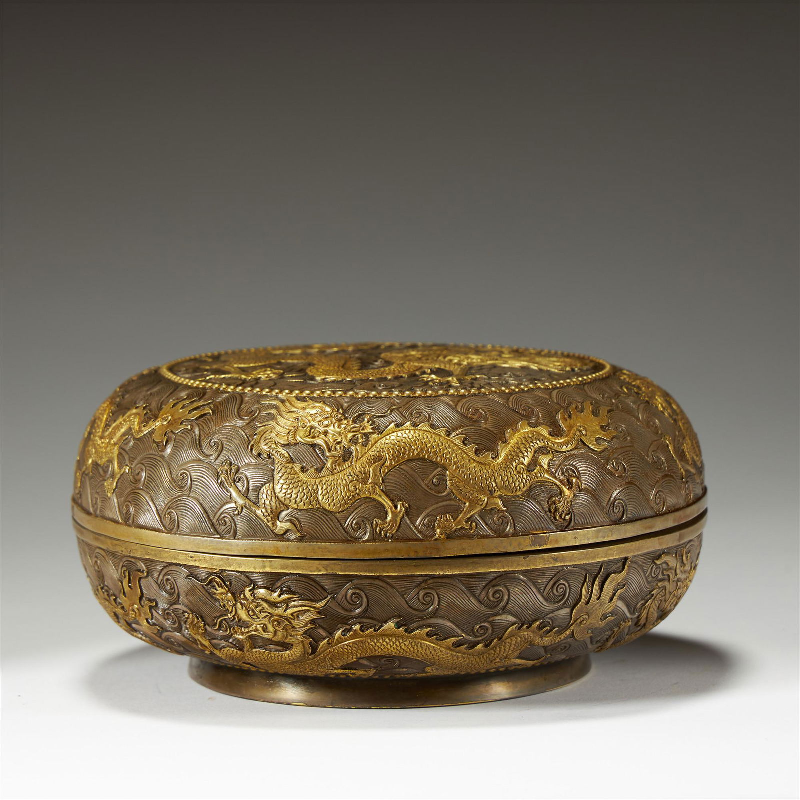A GILT BRONZE "DRAGON" BOX AND COVER (1 of 8)