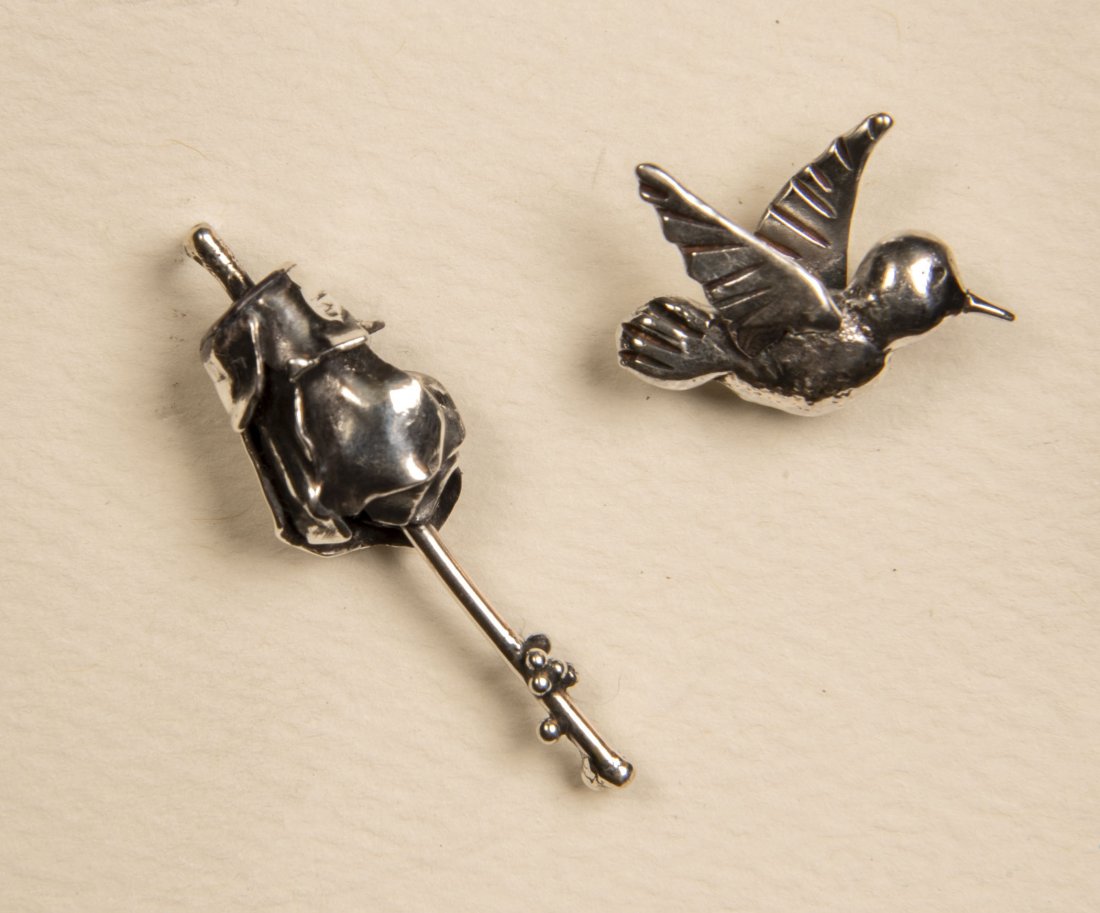 TEENYA BARNARD (American/Texas) SILVER EARRINGS: Hummingbord and Turk's Cap Flower hand-sculpted sterling silver post/stud earrings not signed Provenance: From the collection of the artist. Proceeds from this auction benefit the Rockport Center for