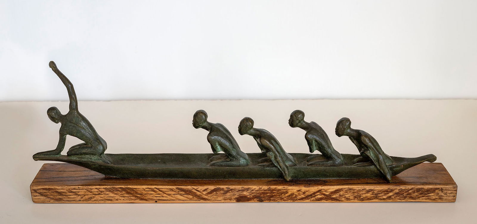 ANDRE-VINCENT BECQUEREL (French 1893-1981) A BRONZE: ANDRE-VINCENT BECQUEREL (French 1893-1981) “Les Piroguiers” (The Boatmen) Bronze affixed to wood base Signed Becquerel 15 1/4 long, 1 1/2 wide, 4 tall inches Proceeds from this auction benefit