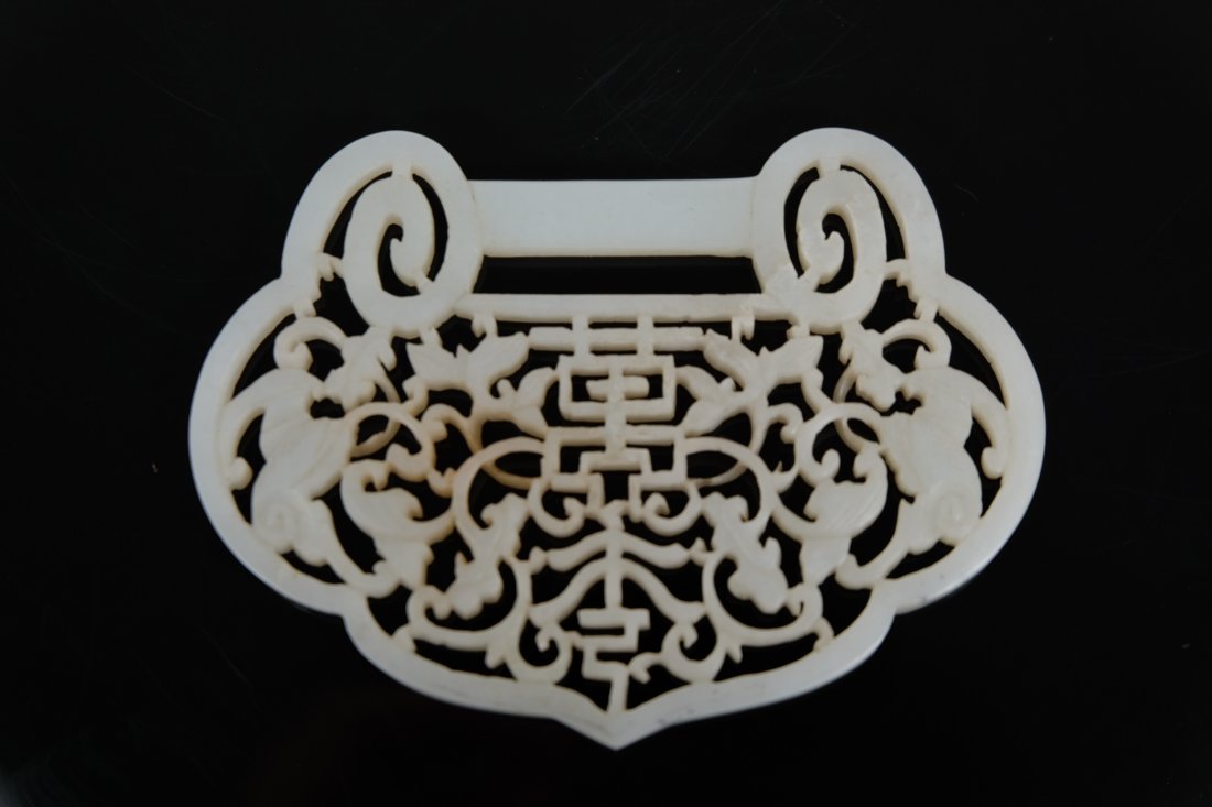 A CHINESE WHITE JADE PLAQUE (1 of 10)