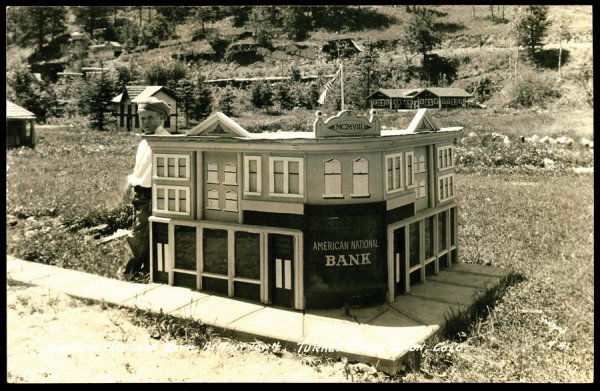 Exteriors , American National Bank, Tiny Town,CO : Exteriors , American National Bank, Tiny Town,CO , Great miniature town in Turkey Creek Canyon, CO. Small boy seen at left of National Bank building. , 1 Postcard