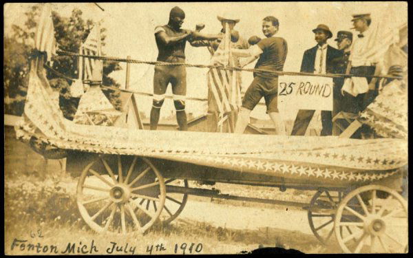 Sports , Boxing - Jack Johnson Float , Wonderful : Sports , Boxing - Jack Johnson Float , Wonderful image of Johnson versus Jeffries, parade float, July 4, 1910, Fenton, Michigan. , 1 Postcard