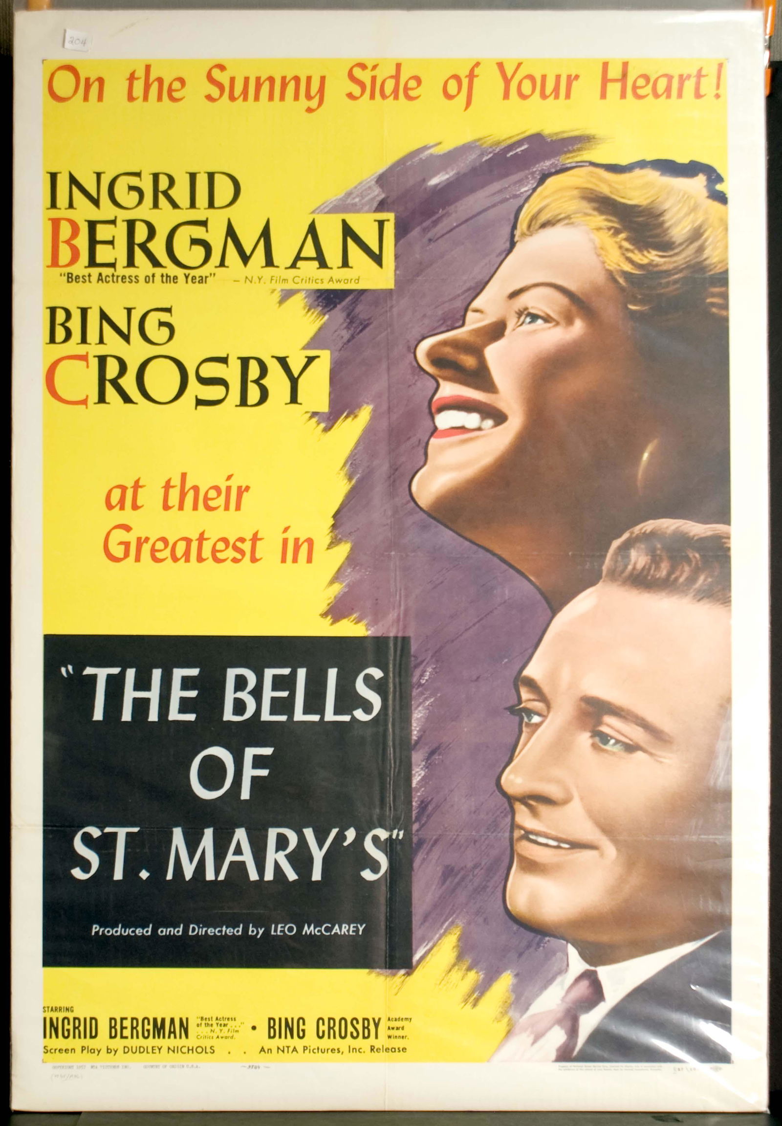 The Bells of St. Mary's Movie Poster: Starring Ingrid Bergman and Bing Crosby. 27" x 41".